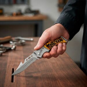 Navaja Automática Cachas Hueso marca Lion Tools modelo 9567 con hoja de acero inoxidable 420, apertura automática y funda de nylon.